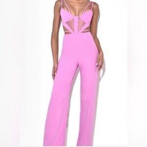 Miss Circle fuchsia cutout strappy jumpsuit.
